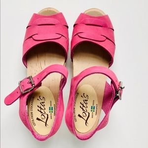 Lotta’s from Stockholm pink peep toe clogs.